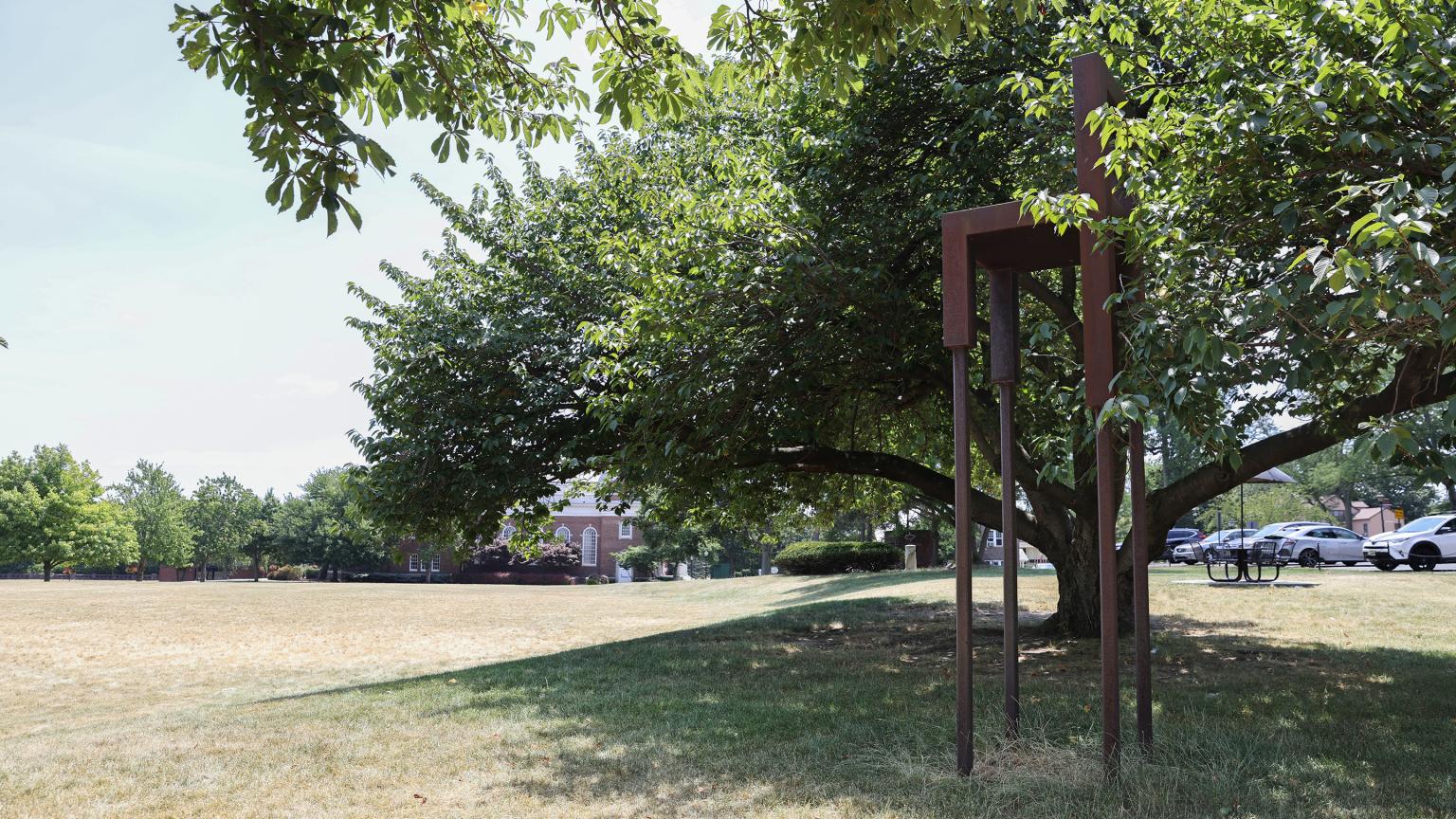 Chair for Looking at Manhattan Island by Michel Gerard located outside the Ruth Adams Building