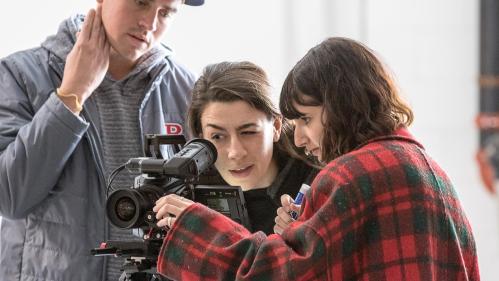 Students use a video camera