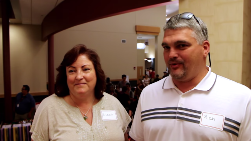 two parents standing