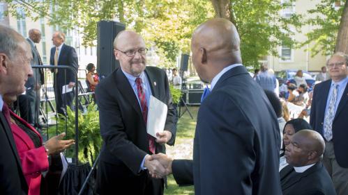Chancellor Molloy shakes hands at Robeson Plaza Dedication Ceremony