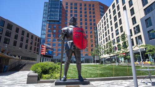 Scarlet Knight statue at the entrance to The Yard on College Avenue