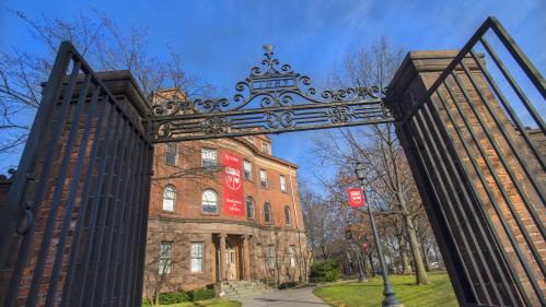 Wrought iron gates open onto Old Queens buildings at Rutgers–New Brunswick