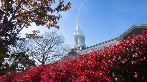 Voorhees Chapel surrounded by red leaves in the fall