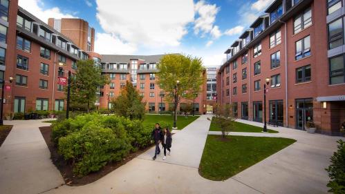 Students walking across a campus