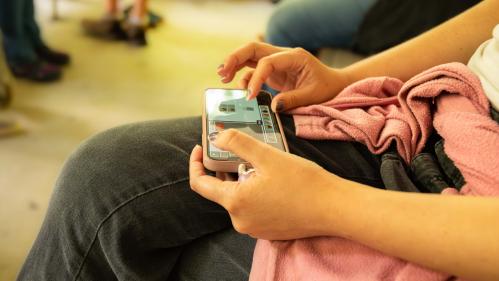 a young girl on her cell phone