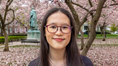 Rutgers-New Brunswick senior Amelia Khoo smiles for the camera at Voorhees Mall on the College Avenue campus.