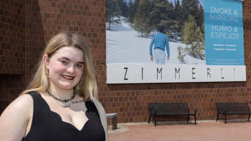 Gabrielle Carmella, a senior attending the Mason Gross School of the Arts, helped Zimmerli Art Museum officials prepare for the "Smoke & Mirrors" exhibition.