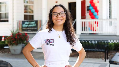 Alejandra Afanador, an RU Voting Ambassador, stands outside the Center for Latino Arts and Culture during a voter registration event on Sept. 22.
