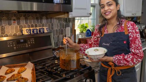 Rutgers senior Prachi Shashidhar serves up soup in her parents' kitchen.
