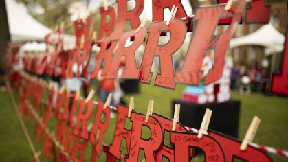 Rs hang on string at Rutgers Day