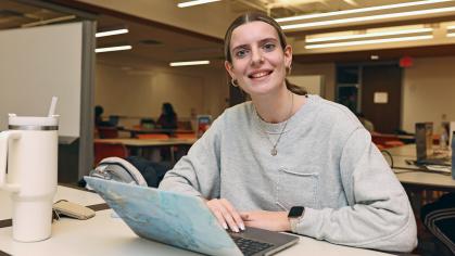 A student works on laptop in the Learning Centers