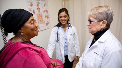 three woman in a medical room