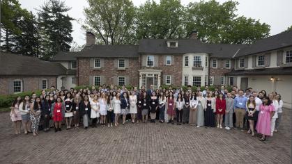 2022 Matthew Leydt inductees gather with President Jonathan Holloway in front of his Piscataway home during a pre-commencement celebration on Friday, May 13, 2022