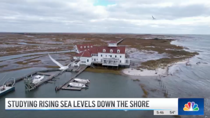 An aerial shot of the Marine Field Station is seen in a television news broadcast talking about sea level rise.