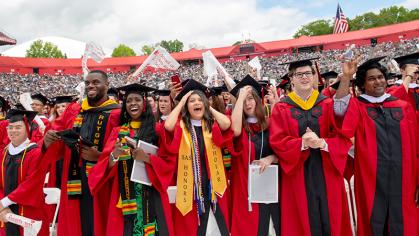 Happy graduates at the Rutgers University-New Brunswick and Rutgers Biomedical and Health Sciences Commencement held at SHI Stadium on Busch campus