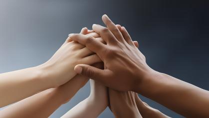 Hands together in teamwork