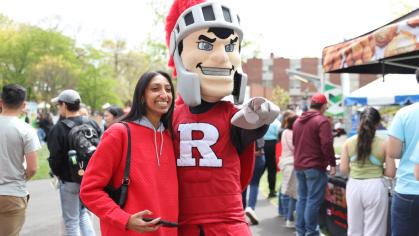 Attendees take photos with the Scarlet Knight on Rutgers Day