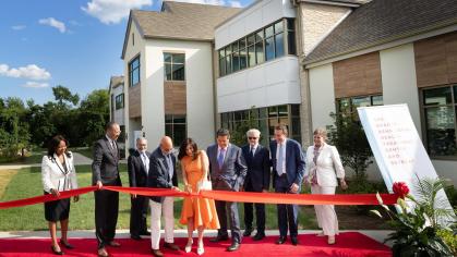 At the Brandt Behavioral Health Treatment Center and Retreat ribbon-cutting ceremony, from left: Rutgers–New Brunswick Chancellor Francine Conway, Rutgers President Jonathan Holloway, Rutgers Health Chancellor Brian L. Strom, Allan Blau RC’63, Marlene Brandt RC’80, RWJBarnabas Health President and CEO Mark E. Manigan, Rutgers University Behavioral Health Care President and CEO Frank A. Ghinassi, Barry Brandt, and Rutgers University Foundation President Kimberly A. Hopely. 
