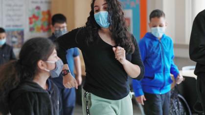 Cassidy Rivas dancing with a class or students