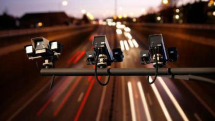 Traffic cameras overlooking a highway