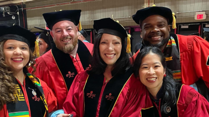 Dr. John Bird and recent graduates of the Rutgers Graduate School of Education at the Commencement ceremony