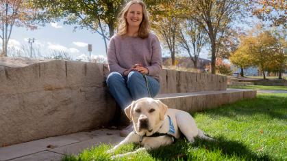 Nadia and truffle sitting on wall
