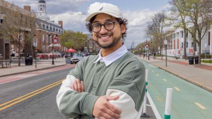 Brandon Wildman, a graduate student at Rutgers University-New Brunswick, stands on College Avenue.