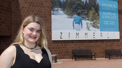 Gabrielle Carmella, a senior attending the Mason Gross School of the Arts, helped Zimmerli Art Museum officials prepare for the "Smoke & Mirrors" exhibition.