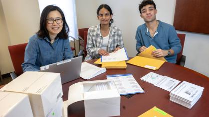 Students assemble and prepare distribution of home stool test kits at the Eric B. Chandler Health Center