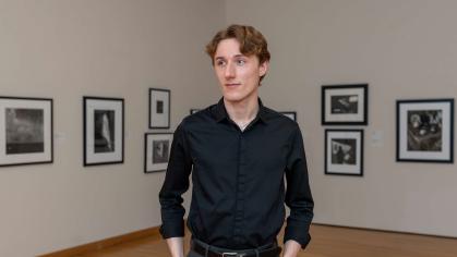 Rutgers University-New Brunswick student Reece Goodson stands in a gallery at the Zimmerli at Rutgers-New Brunswick.