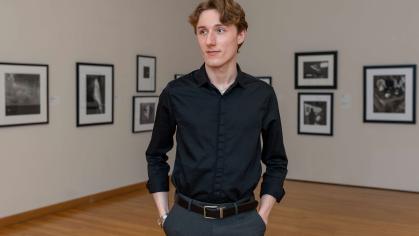 Rutgers University-New Brunswick student Reece Goodson stands in a gallery at the Zimmerli at Rutgers-New Brunswick.