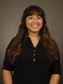 Karina Vaszquez in a quarter-sleeve black top