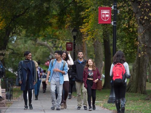 students walking on College Avenue campus