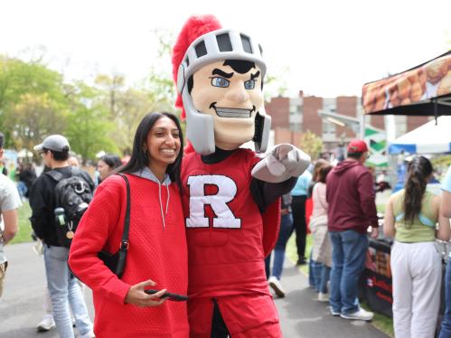 Attendees take photos with the Scarlet Knight on Rutgers Day