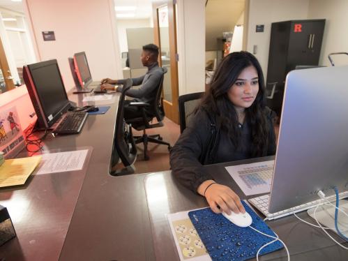 Romaisa Syed (SCI ’20) works at the OIT reception desk in Tillet Hall