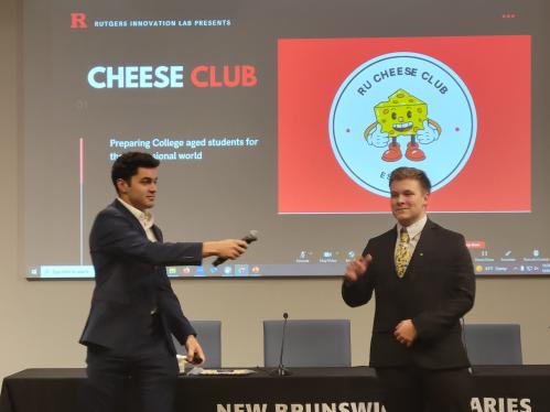 Two student presenting their idea at Idea Incubator demo day.