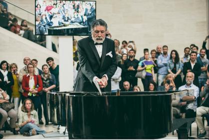 Raphael Montañez Ortiz at one of his many piano destruction concerts, at the Mudam museum in Luxembourg. Photo courtesy of Ortiz.