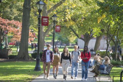 Group of students walking on campus