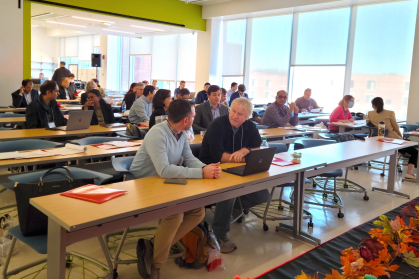 Attendees talk during a research ideation forum on machine learning and artificial intelligence