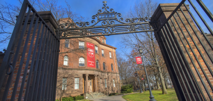 Wrought iron gates open onto Old Queens buildings at Rutgers–New Brunswick