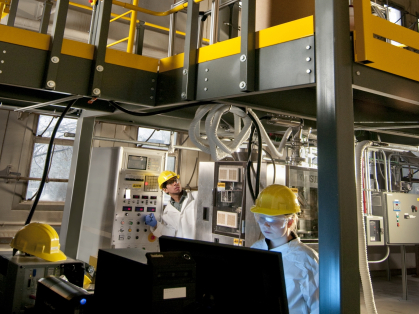 People standing near machinery