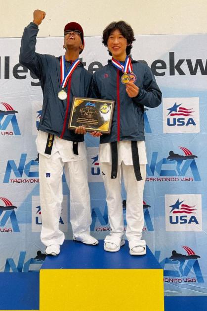Malik Dobson and Ian Hong stand on the podium at the 2024 National Collegiate Taekwondo Association Championships held in April in California