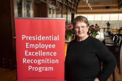  JoAnn Arnholt, Director Student Affairs, Fraternity and Sorority Affairs, Outstanding Service Award recipient poses for a photo at the Presidential Employee Excellence Recognition Program Award Ceremony held at the Rutgers Club.