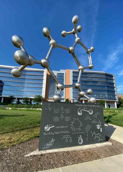 "The PhD Molecule" is in front of the Chemistry and Chemical Biology Building on Busch campus at Rutgers New-Brunswick.
