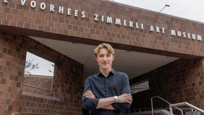 Reece Goodson poses at the entrance of the Zimmerli Art Museum at Rutgers-New Brunswick