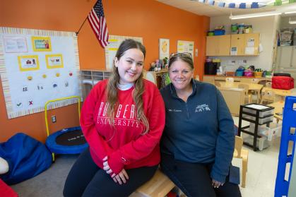 Rutgers junior Ara Spielman, left, works in Debra Coates, a special education teacher at Paul Robeson Community School for the Arts.