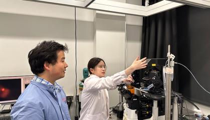 Man and woman work in a science laboratory