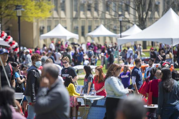 People explore booths at Rutgers Day on Busch Campus