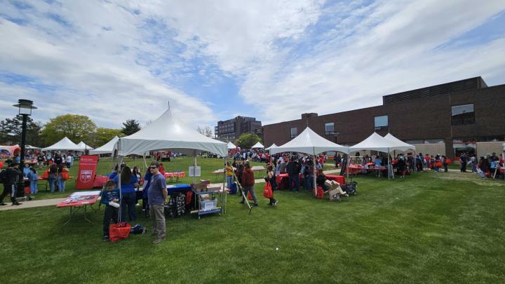 Tents of programs on the grassy quad during Rutgers Day 