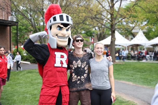 Attendees take photos with the Scarlet Knight on Rutgers Day